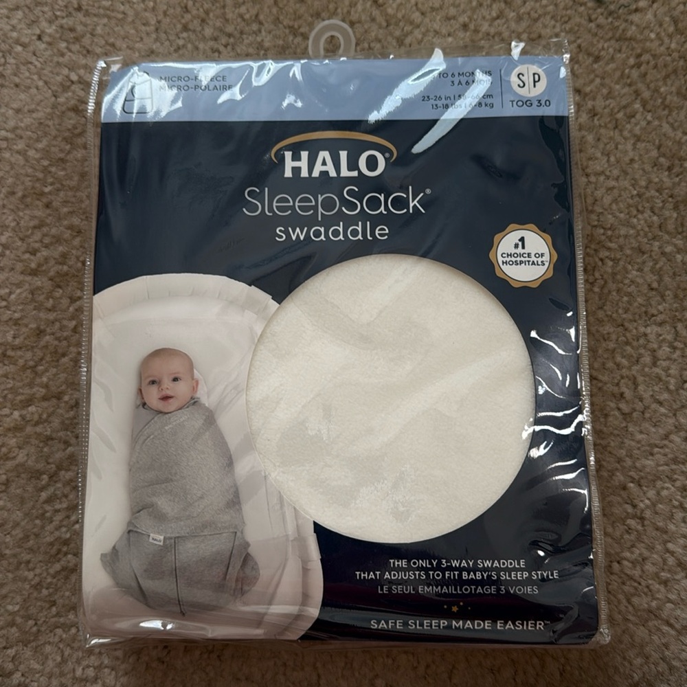 Halo SleepSack Swaddle in Cream with Animal Accents